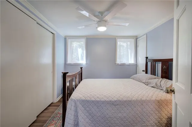 a view of house with backyard space and garden