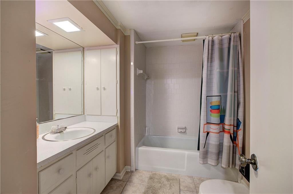 450 Little Hendricks Mountain Road Jasper, GA 30143 - Photo 47 of 61 a bathroom with a sink toilet and shower