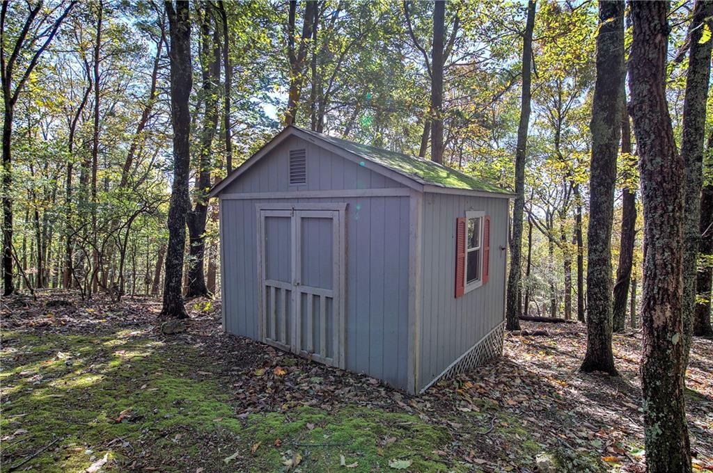 450 Little Hendricks Mountain Road Jasper, GA 30143 - Photo 55 of 61 a front view of a house with garden
