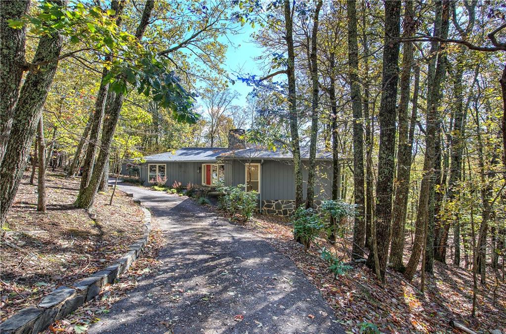 450 Little Hendricks Mountain Road Jasper, GA 30143 - Photo 58 of 61 a view of a house with a yard and sitting area