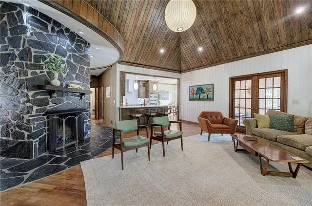 a kitchen with a table and chairs in it
