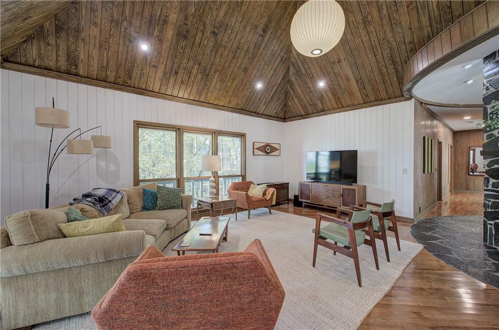 450 Little Hendricks Mountain Road Jasper, GA 30143 - Photo 10 of 61 a living room with furniture and a flat screen tv