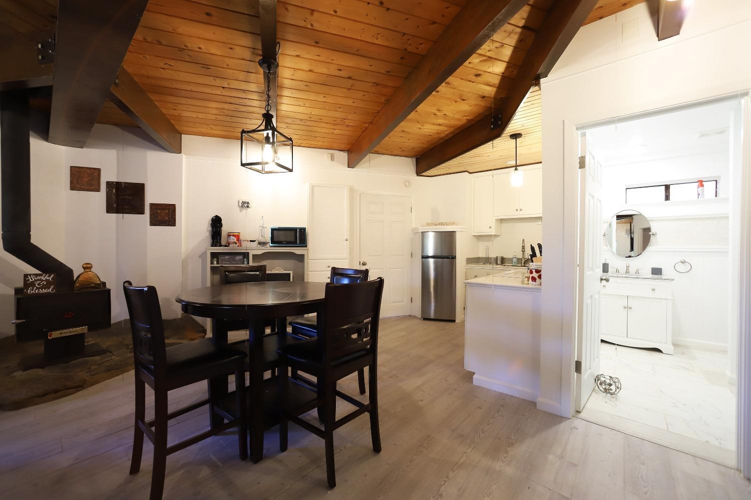 1870 Cable Road Camino, CA 95709 - Photo 15 of 36 a view of a dining room with furniture