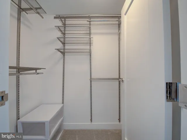 a bathroom with a shower and toilet