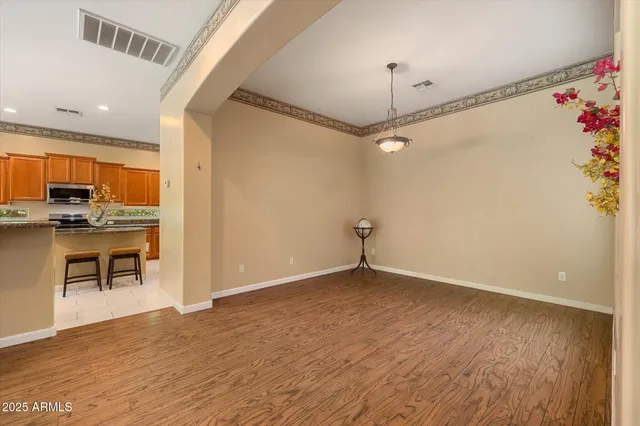 a view of a backyard with potted plants