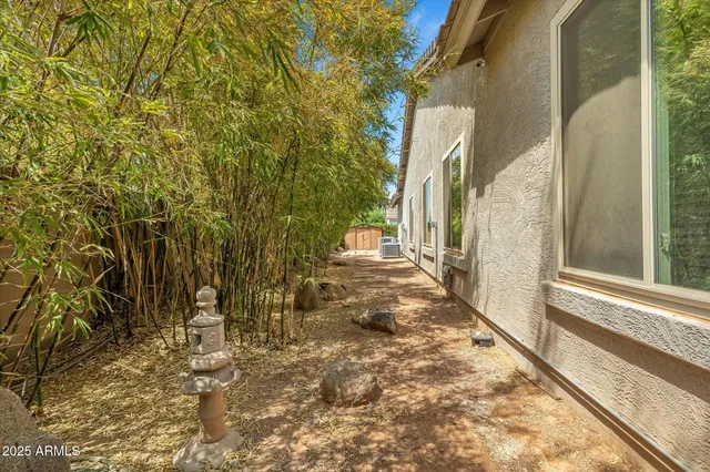 swimming pool with outdoor seating and yard