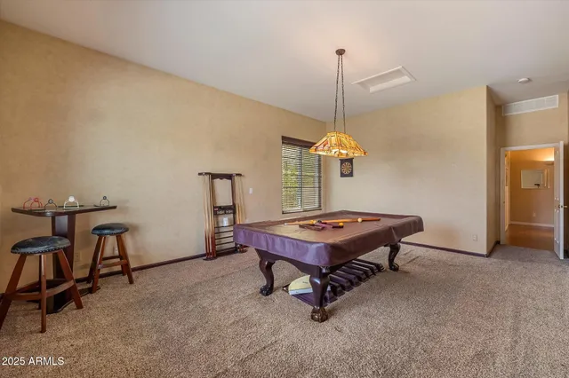 a room with furniture and a chandelier