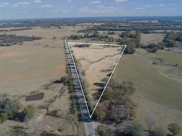 an aerial view of beach and ocean