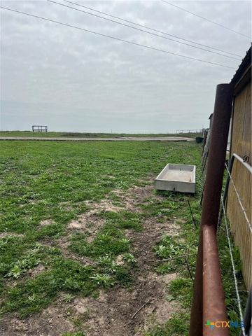 a view of yard with an outdoor space