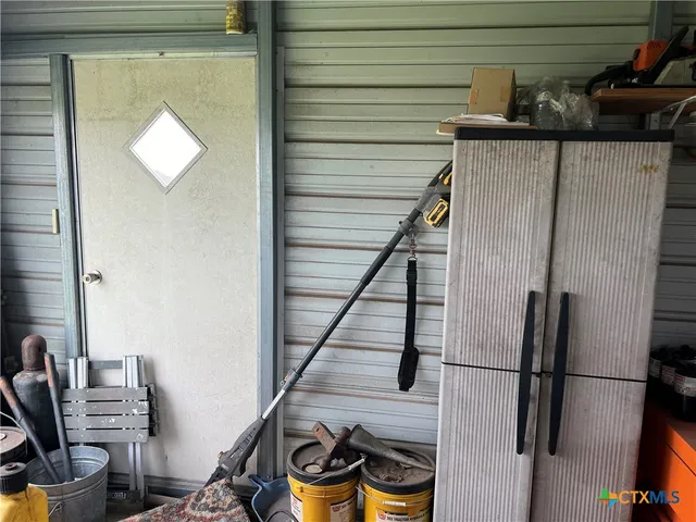 a view of entryway and workspace