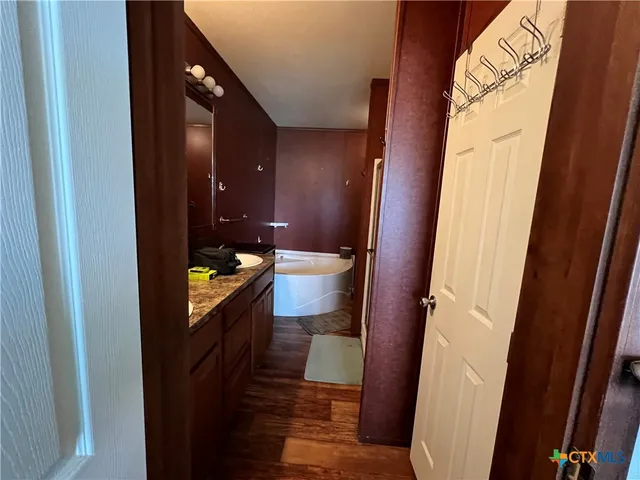a bathroom with a sink and a toilet