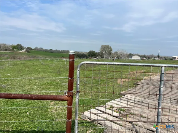a view of a lake from a balcony