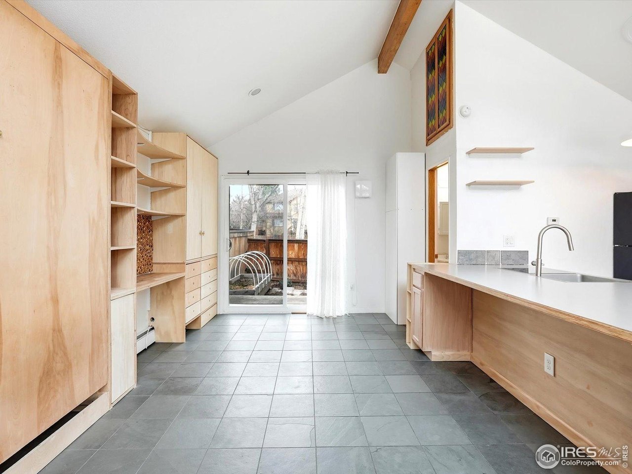 4855 Edison Avenue, Unit A Boulder, CO 80301 - Photo 11 of 44 Sliding glass doors to patio