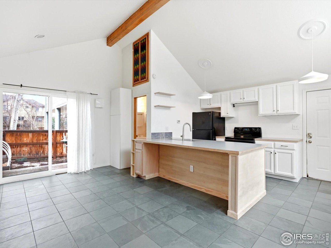 4855 Edison Avenue, Unit A Boulder, CO 80301 - Photo 12 of 44 Vaulted ceilings