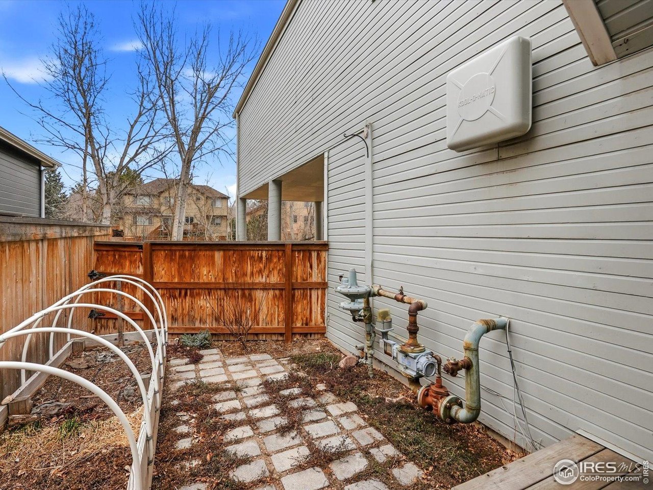 4855 Edison Avenue, Unit A Boulder, CO 80301 - Photo 15 of 44 Enclosed Patio area with raised garden bed