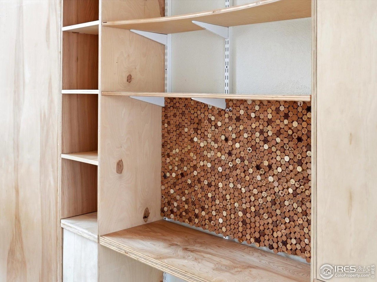 4855 Edison Avenue, Unit A Boulder, CO 80301 - Photo 24 of 44 Cork board on wall unit