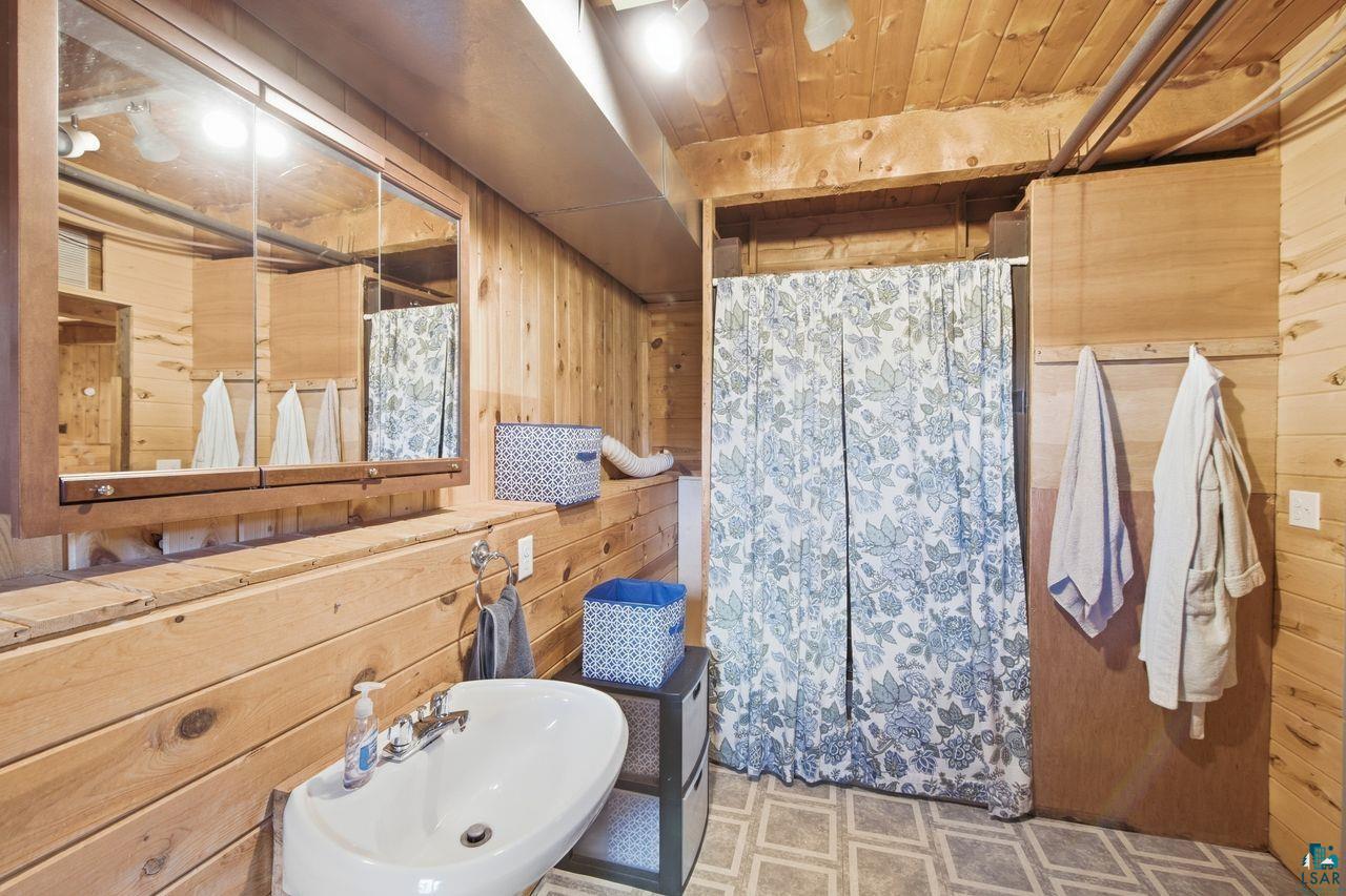 65889 Old County Road Marengo, WI 54855 - Photo 24 of 44 Wood-paneled walls and ceiling