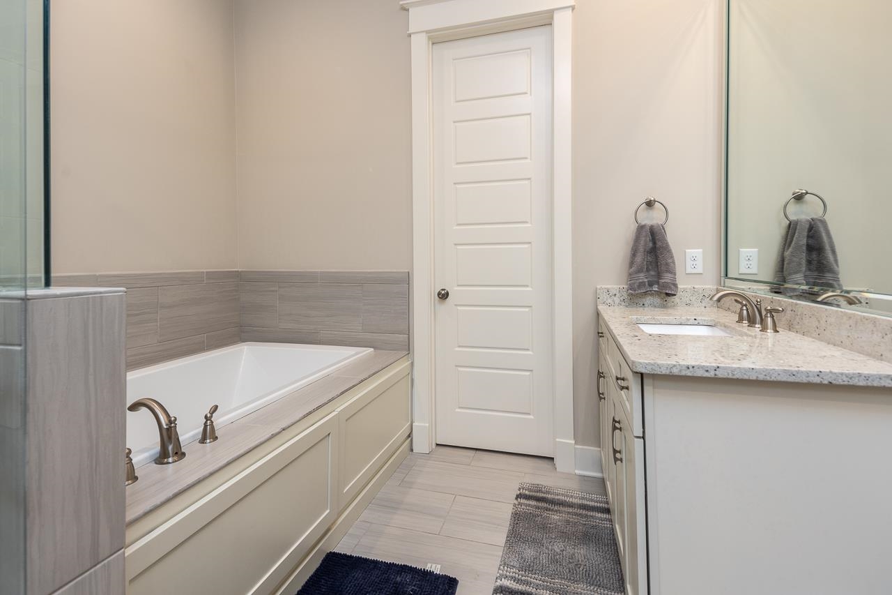458 South Shea Road Collierville, TN 38017 - Photo 21 of 27 Bathroom with vanity and a bath