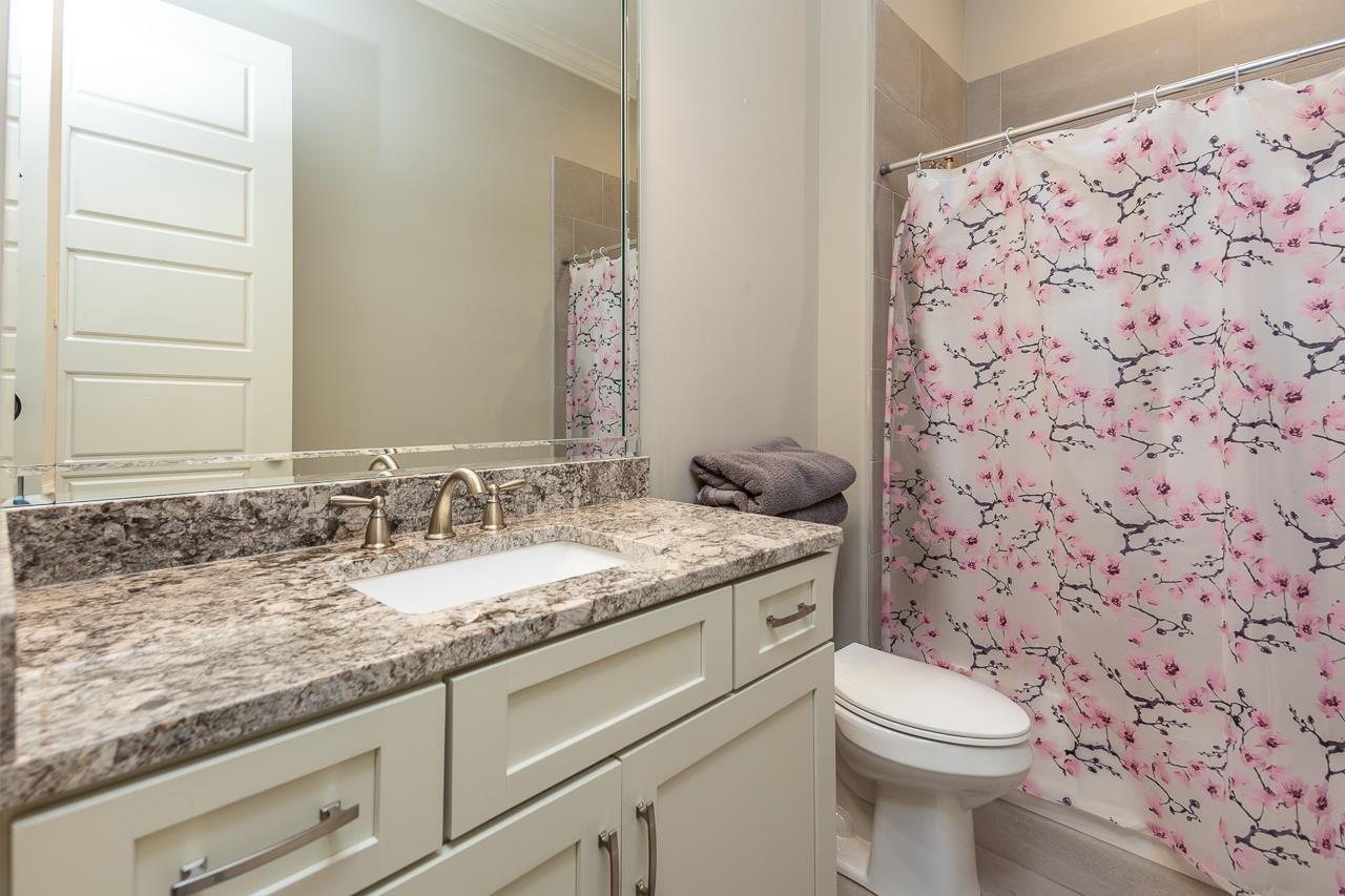 458 South Shea Road Collierville, TN 38017 - Photo 24 of 27 Full bathroom with vanity, ornamental molding, toilet, and shower / bathtub combination with curtain