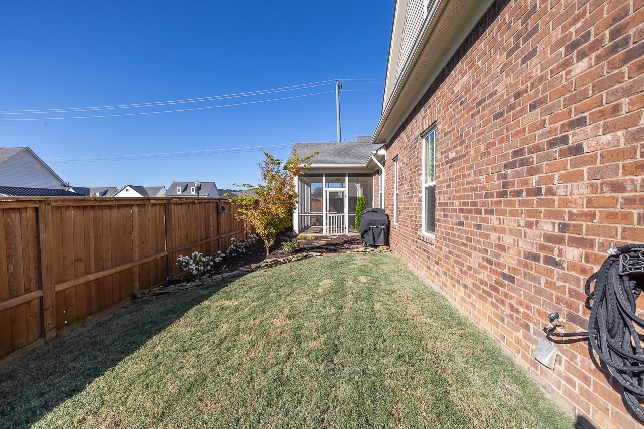 458 South Shea Road Collierville, TN 38017 - Photo 3 of 27 View of yard featuring a sunroom
