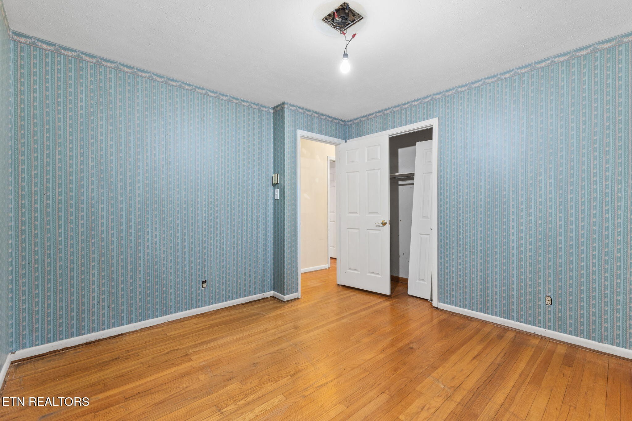 101 Albright Road Oak Ridge, TN 37830 - Photo 22 of 37 wooden floor in an empty room