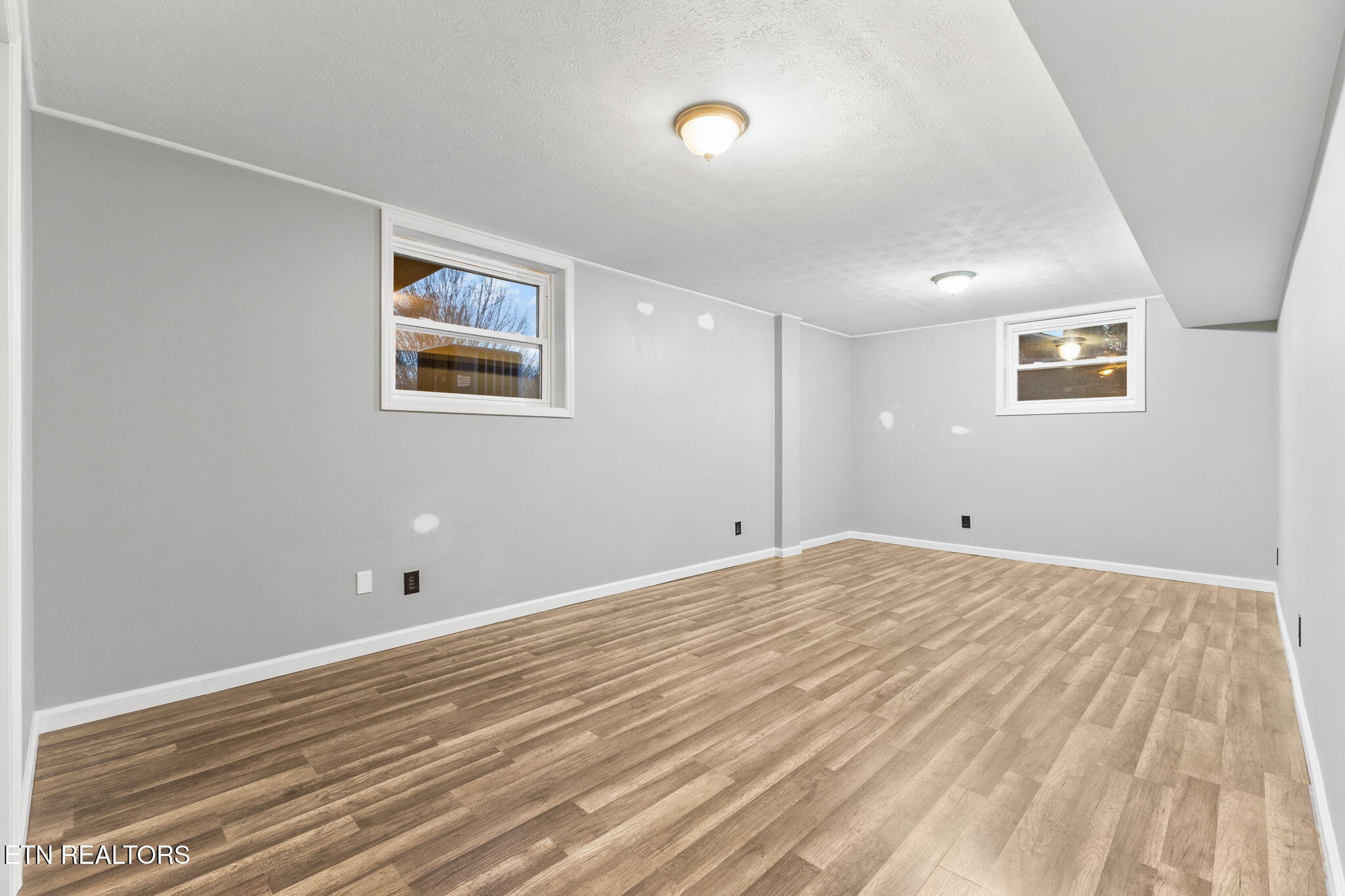 101 Albright Road Oak Ridge, TN 37830 - Photo 27 of 37 a view of room with wooden floor and window