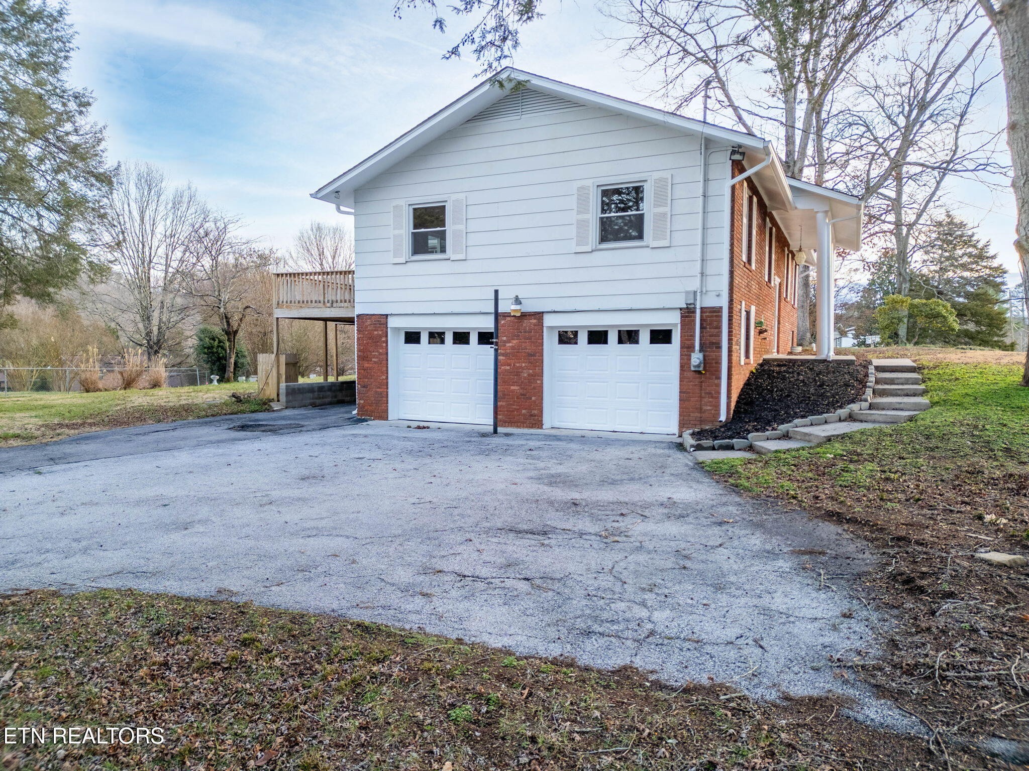 101 Albright Road Oak Ridge, TN 37830 - Photo 35 of 37 a view of a house with a yard