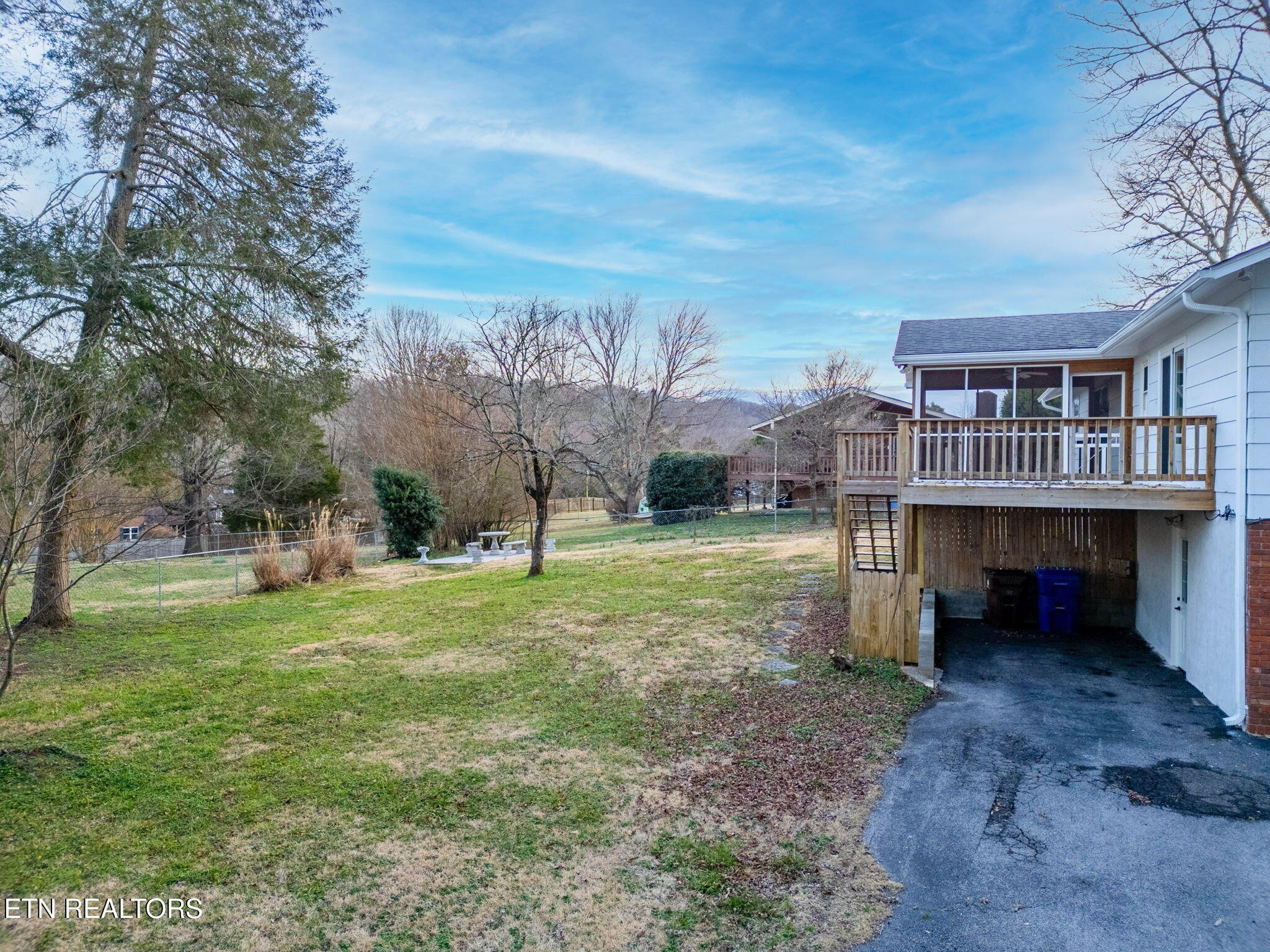 101 Albright Road Oak Ridge, TN 37830 - Photo 36 of 37 a view of a house with a yard and sitting area
