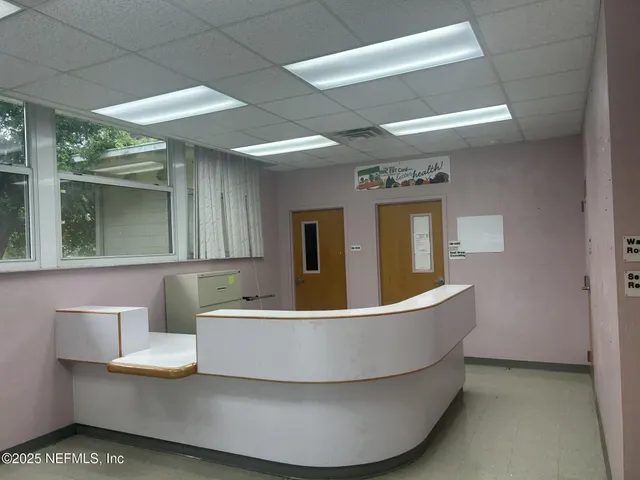 a view of walk in closet with window