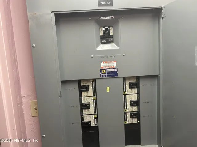 a view of field with tall trees