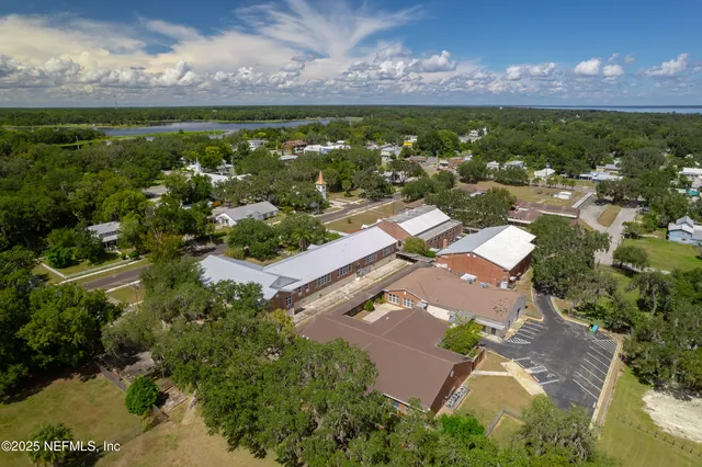 an aerial view of a house with a garden