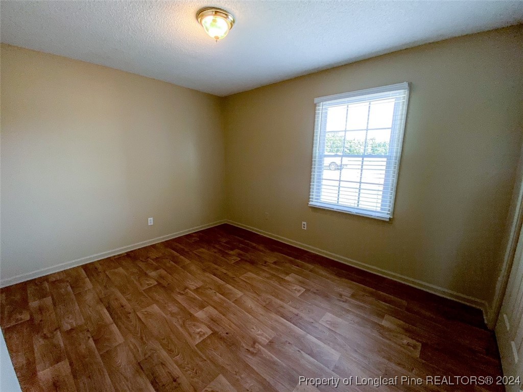 1829 Horne Camp Road, Unit 2 Fairmont, NC 28340 - Photo 9 of 18 an empty room with windows