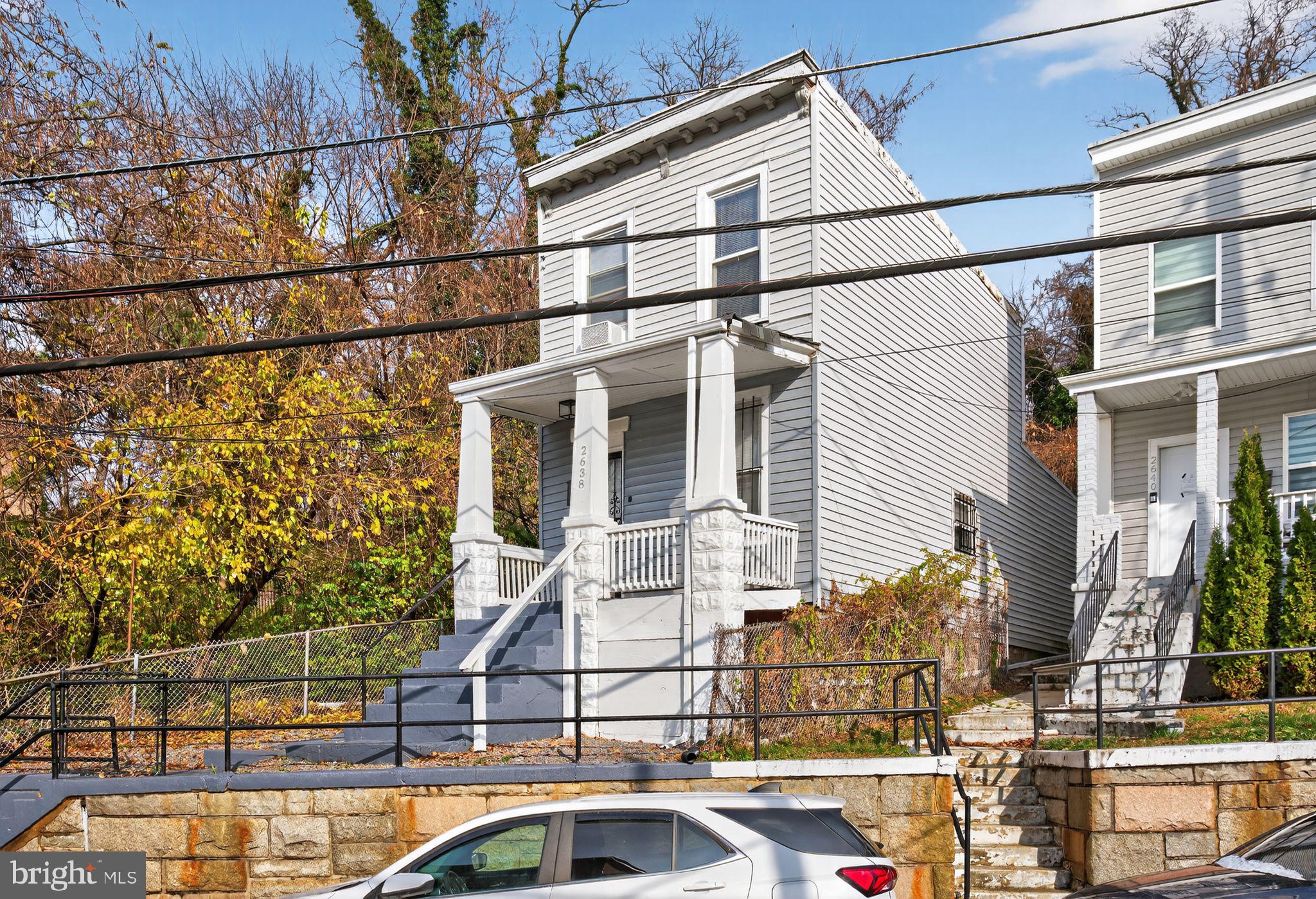 a view of a house with a street