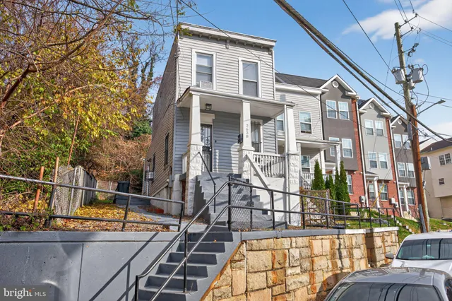 front view of a house with a large windows