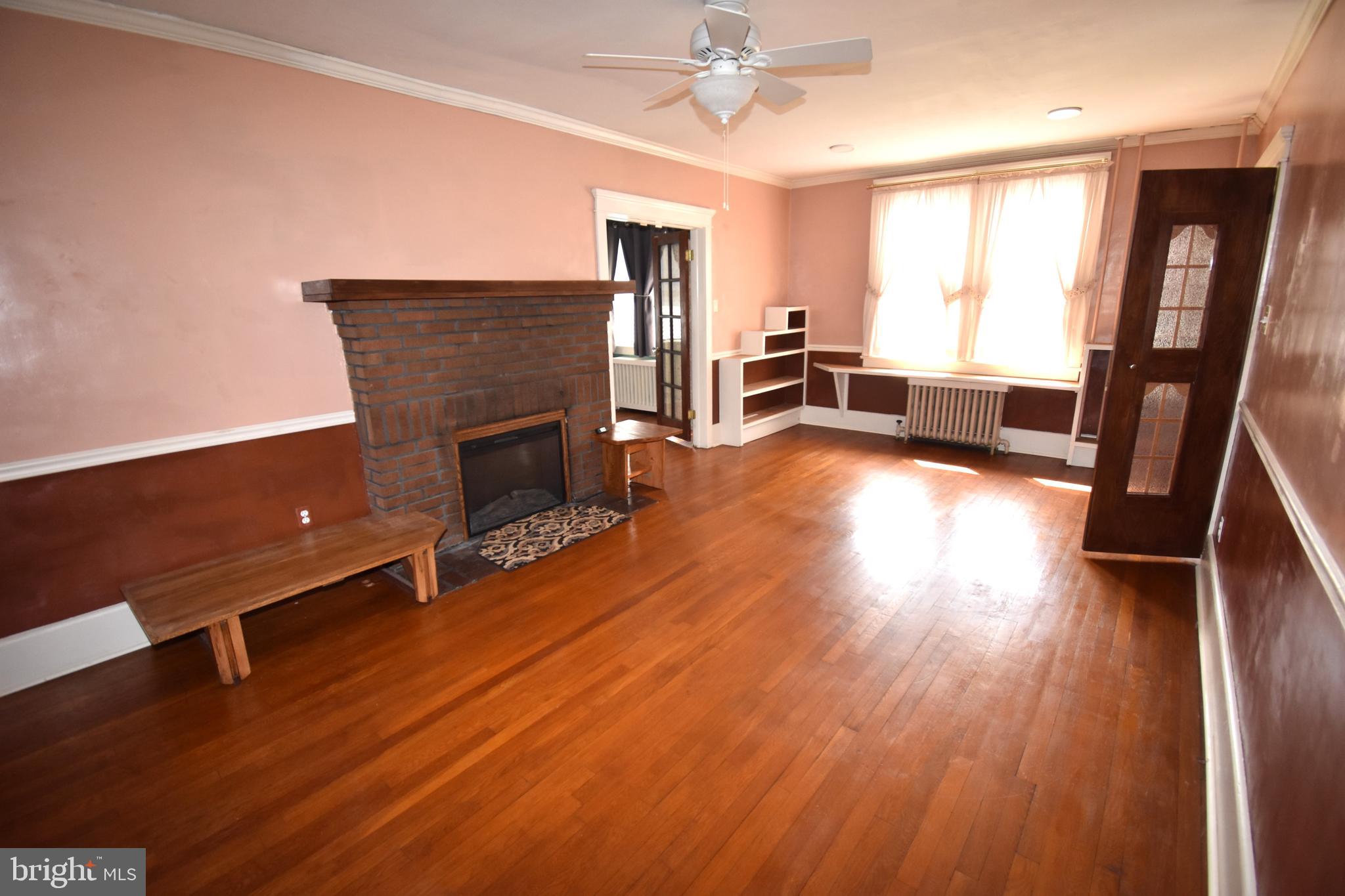 781 Salem Road Burlington, NJ 08016 - Photo 12 of 30 wooden floor fireplace and windows in an empty room