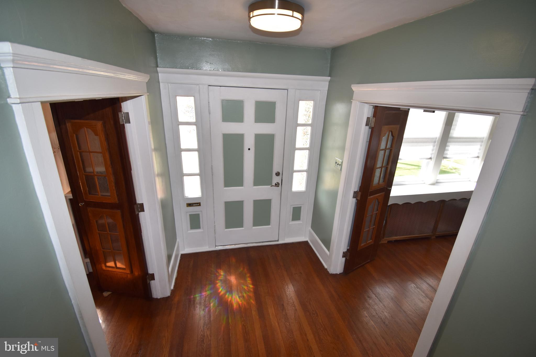 781 Salem Road Burlington, NJ 08016 - Photo 8 of 30 a view of an entryway with wooden floor and door
