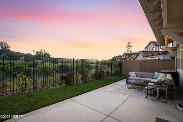 a view of a balcony with an ocean view