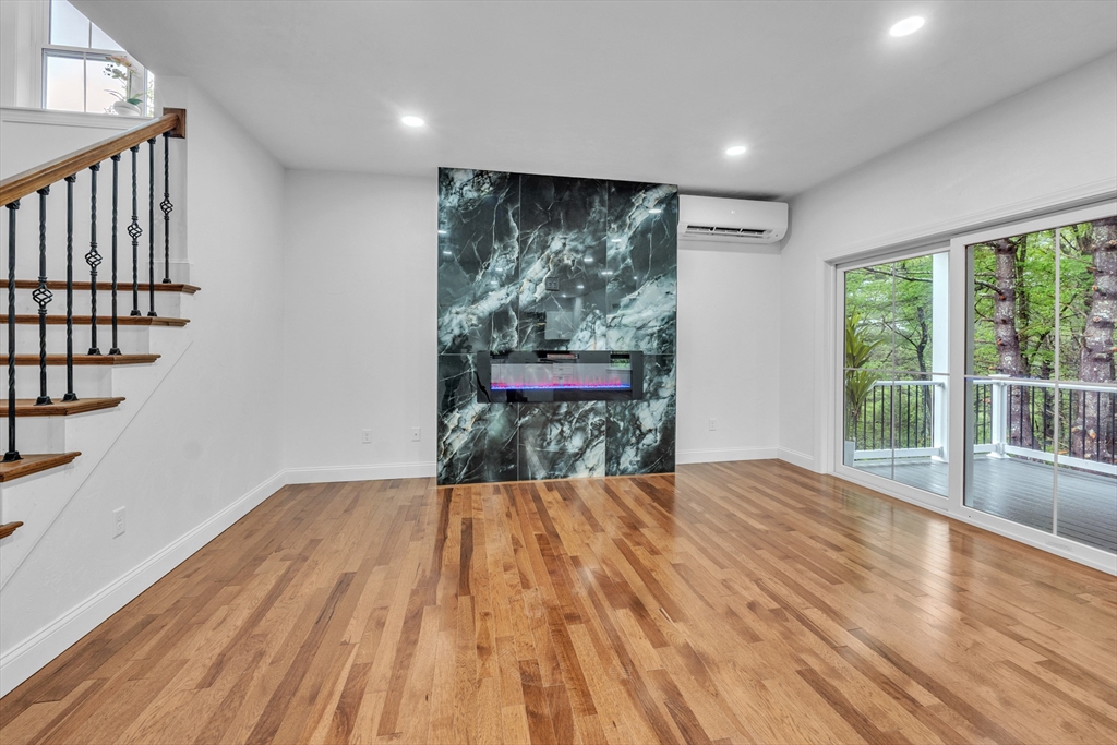 35 Blood Road Charlton, MA 01507 - Photo 12 of 38 a view of empty room with wooden floor and fan