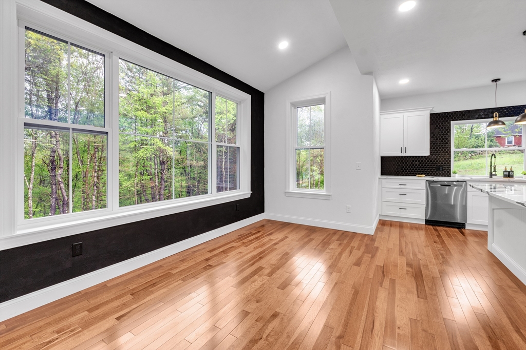 35 Blood Road Charlton, MA 01507 - Photo 17 of 38 a view of a kitchen with microwave and windows