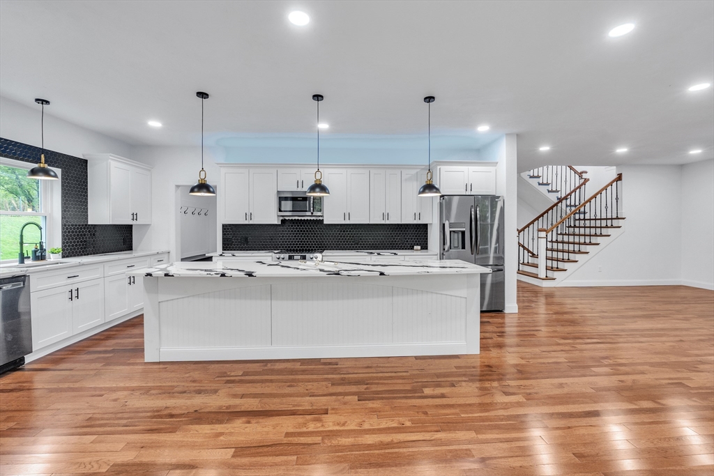 35 Blood Road Charlton, MA 01507 - Photo 21 of 38 a view of kitchen with stainless steel appliances kitchen island a sink and a stove