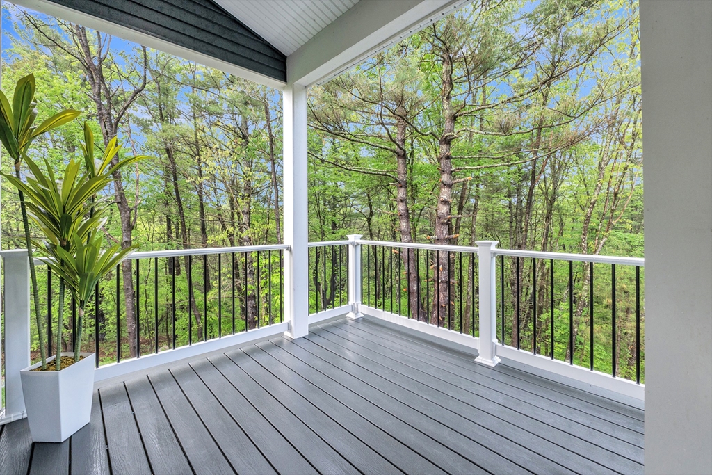 35 Blood Road Charlton, MA 01507 - Photo 26 of 38 a view of balcony with wooden floor