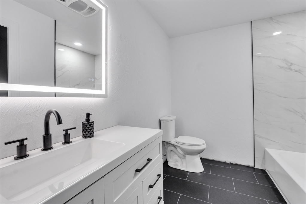 35 Blood Road Charlton, MA 01507 - Photo 31 of 38 a bathroom with a sink and a toilet