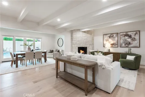 a kitchen with stainless steel appliances a sink stove and refrigerator