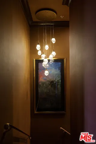 a view of a livingroom with furniture and wooden floor