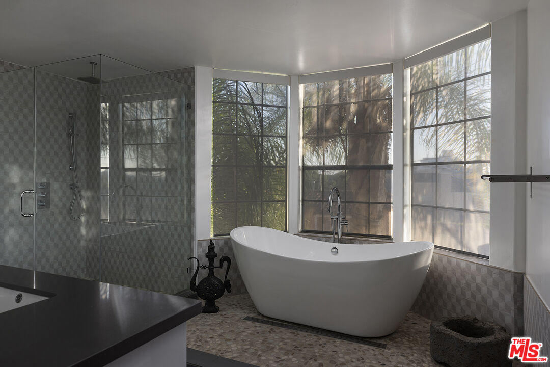 960 North Doheny Drive, Unit 306 West Hollywood, CA 90069 - Photo 21 of 31 a view of a bathtub in a room