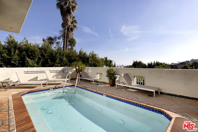 a view of a terrace with furniture and a potted plant