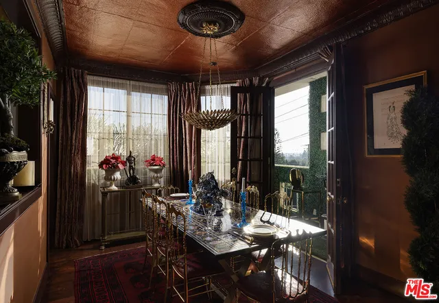 a view of a dining room with furniture window and outside view
