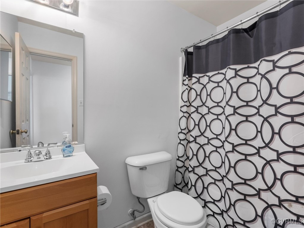 3043 Amherst Ridge Way Colonial Heights, VA 23834 - Photo 13 of 27 Bathroom featuring vanity and curtained shower