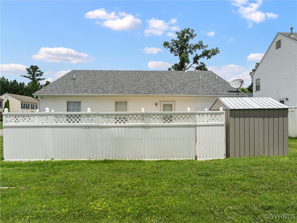 3043 Amherst Ridge Way Colonial Heights, VA 23834 - Photo 26 of 27 View of grassy yard featuring a storage unit