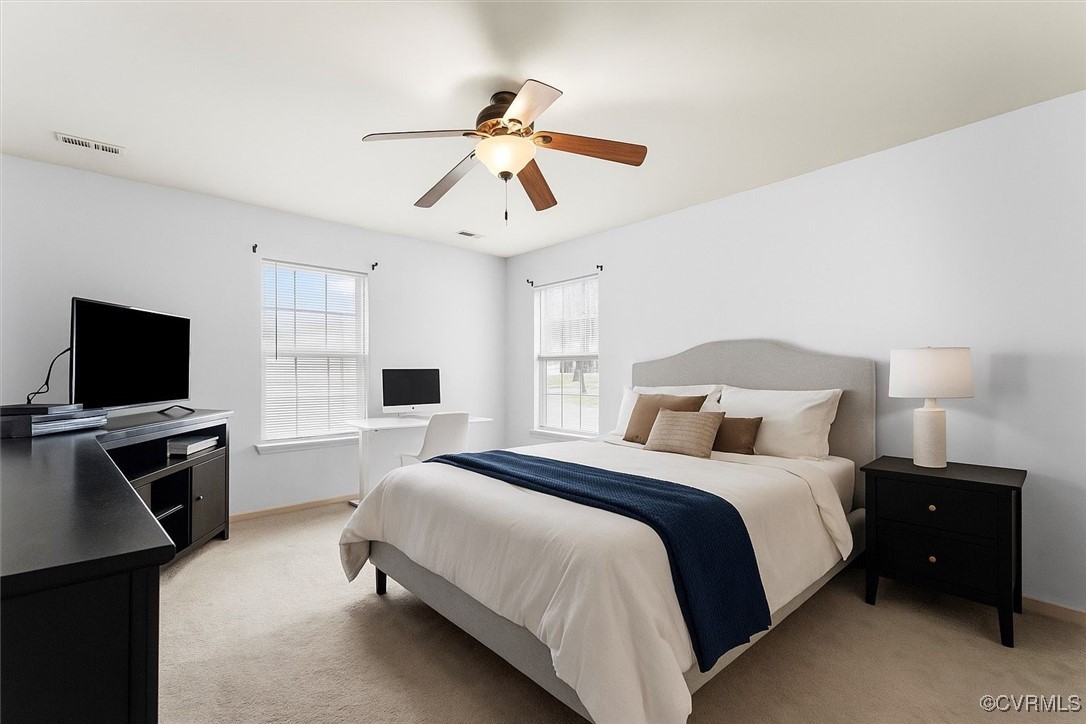 *Virtually Staged* Bedroom featuring light carpet